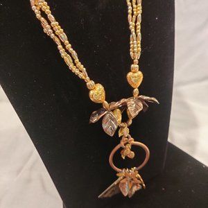 Necklace, ornate, 16-inch, gold-like finish, unique vintage